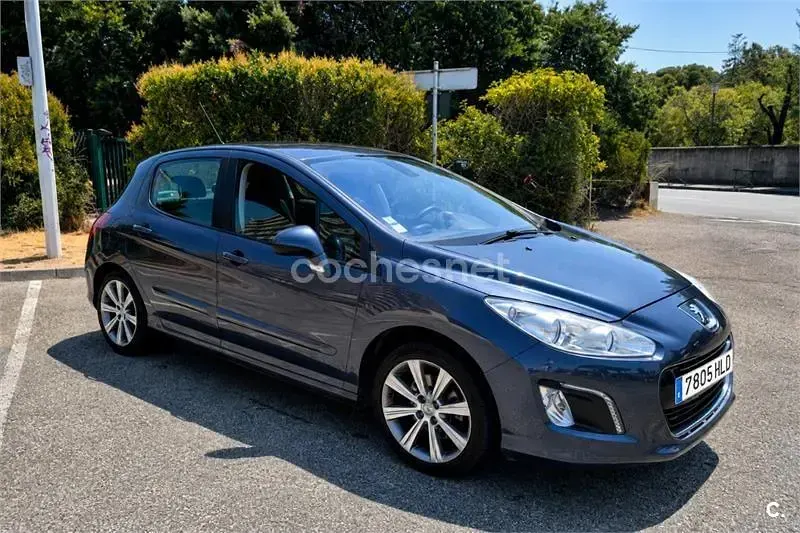 Usado Peugeot 308 SW Access 120 CV (88 kW) 2012 Gris / plata Familiar