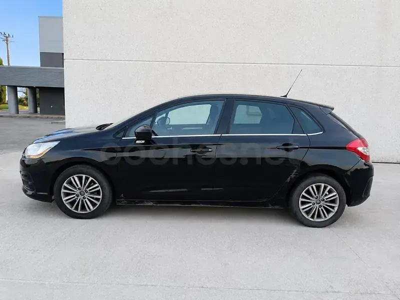 Usado Citroën C4 114 CV (83 kW) 2013 Negro Berlina