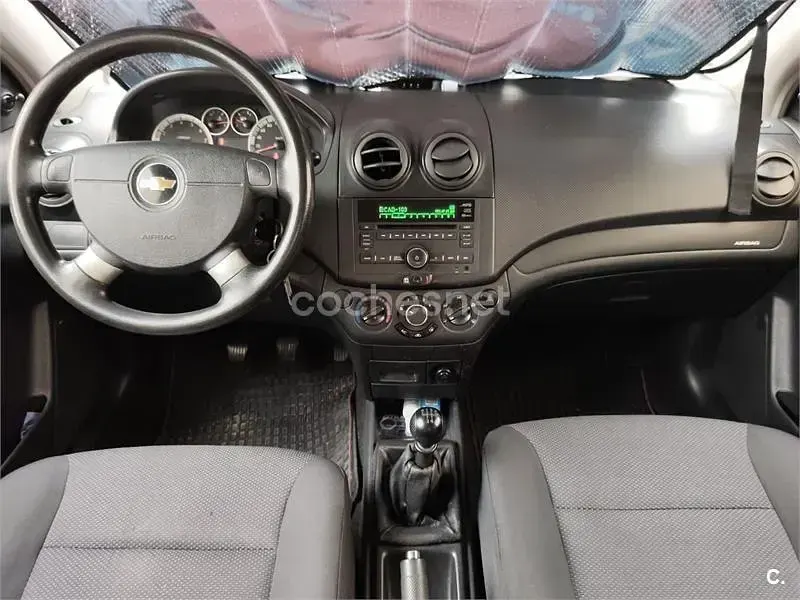 Usado Chevrolet Aveo LS 94 CV (69 kW) 2010 Gris / plata Berlina