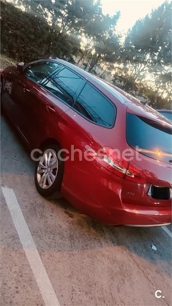 Usado Peugeot 308 SW Style 130 CV (95 kW) 2016 Granate Familiar