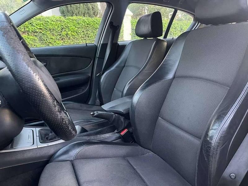 Usado BMW 116 122 CV (89 kW) 2007 Negro Utilitario