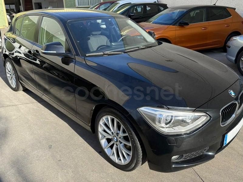 Usado BMW 118 Sport Line 170 CV (125 kW) 2012 Negro Utilitario