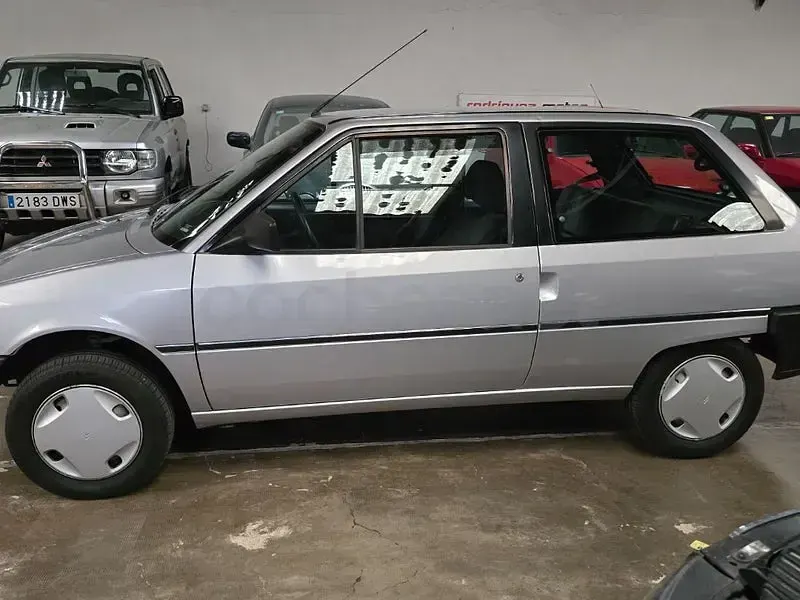 Usado Citroën AX First 54 CV (39 kW) 1994 Gris / plata Utilitario