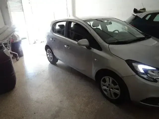 Usado Opel Corsa Expression 90 CV (66 kW) 2016 Gris Utilitario