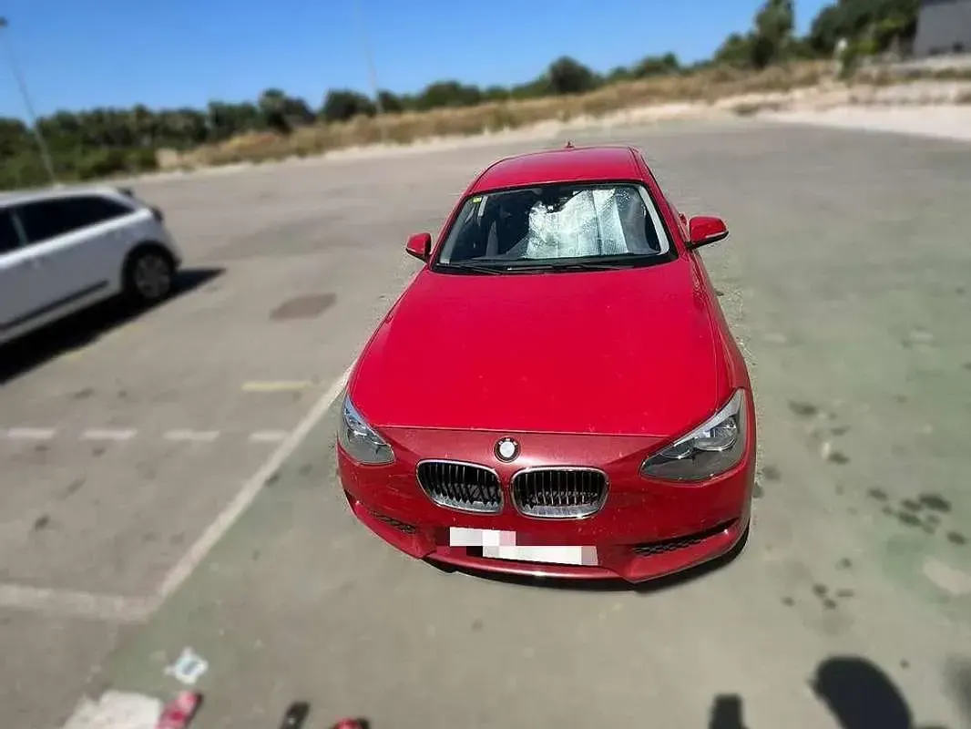 Usado BMW 116 116 CV (85 kW) 2013 Rojo Utilitario