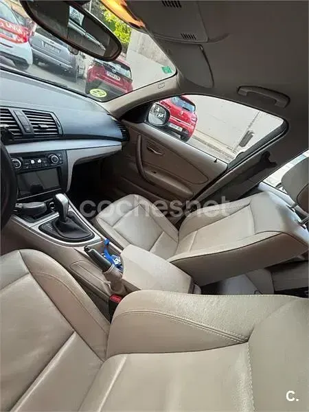 Używany BMW 118 143 KM (105 kW) 2010 Czarny Hatchback