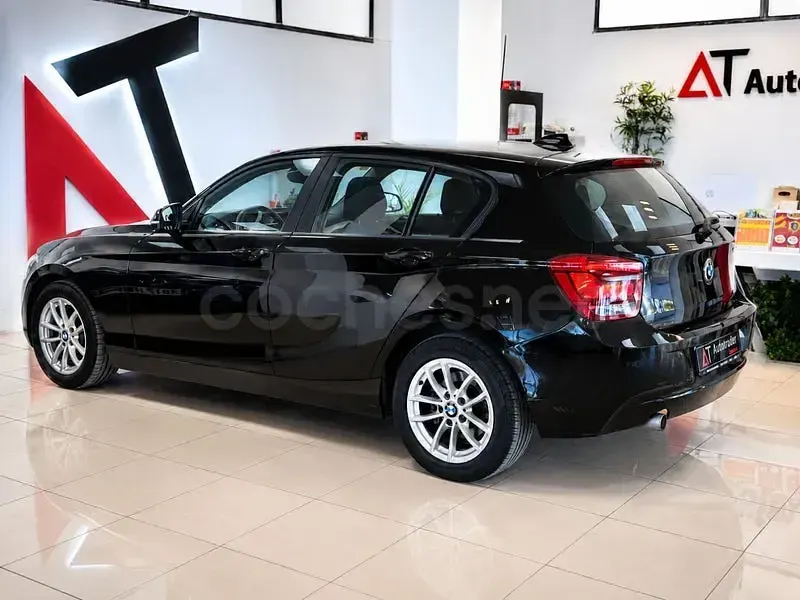 Usado BMW 116 116 CV (85 kW) 2012 Negro Utilitario