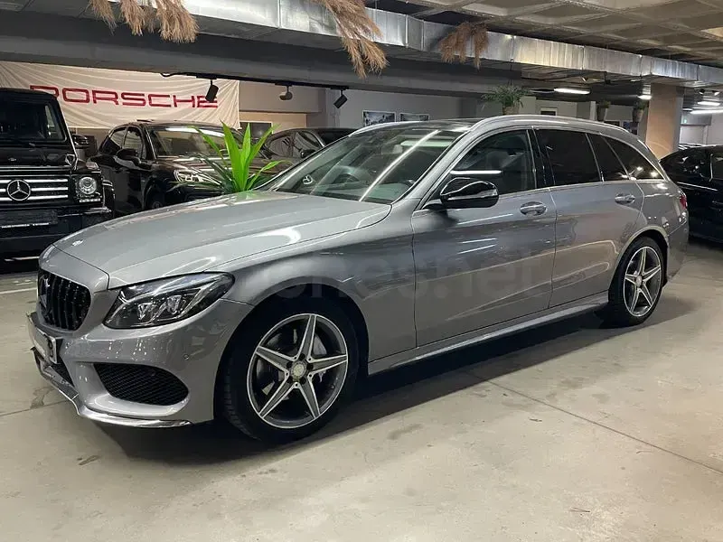 Usado Mercedes C220 AMG line 170 CV (125 kW) 2015 Gris / plata Familiar