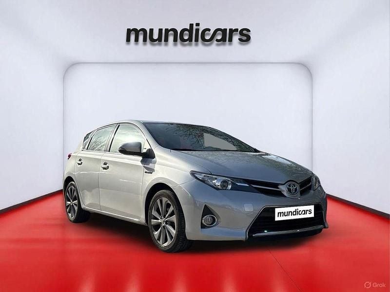 Usado Toyota Auris Hybrid Advance 136 CV (100 kW) 2013 Plateado Berlina