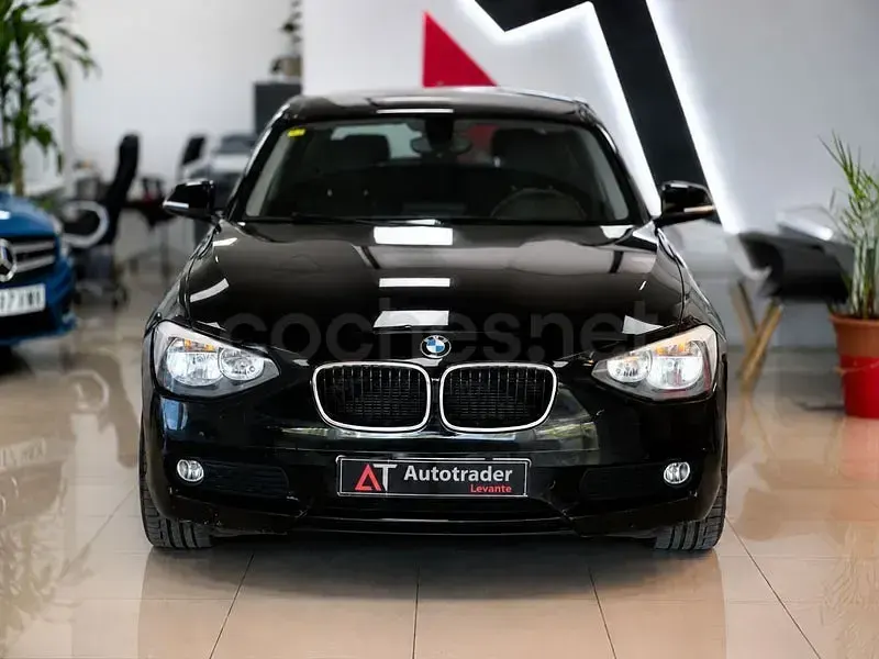 Usado BMW 116 116 CV (85 kW) 2012 Negro Utilitario