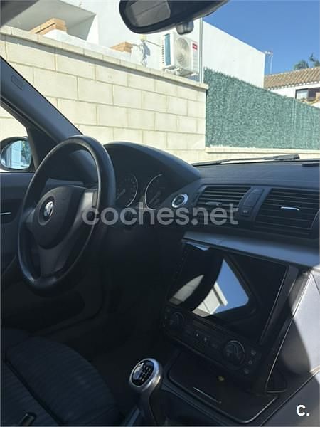 Usado BMW 118 122 CV (89 kW) 2005 Negro Utilitario