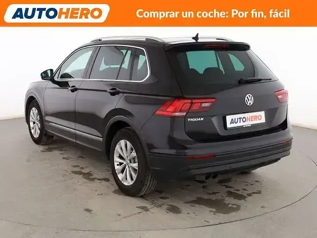 Käytetty VW Tiguan 125 HP (91 kW) 2018 Musta Katumaasturi