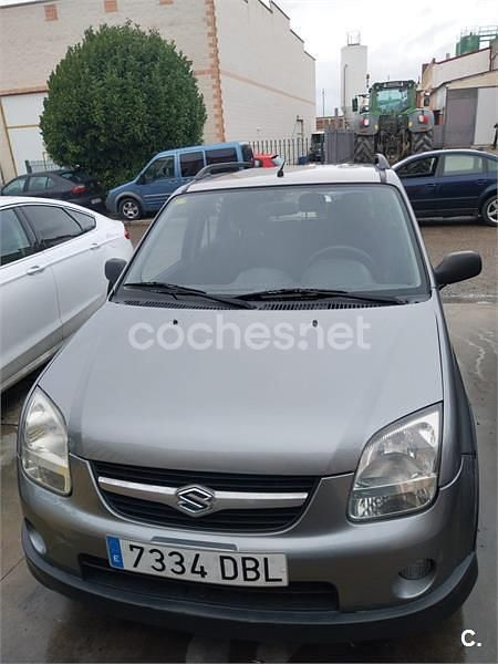 Usado Suzuki Ignis 99 CV (72 kW) 2004 Gris / plata Utilitario