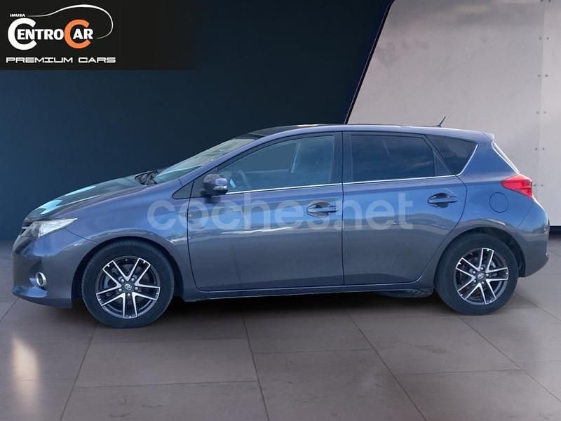 Usado Toyota Auris 124 CV (91 kW) 2014 Gris / plata Berlina
