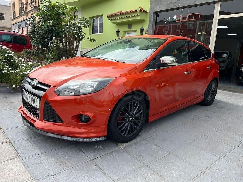 Używany Ford Focus Titanium 125 KM (91 kW) 2012 Pomarańczowy Sedan/Limuzyna