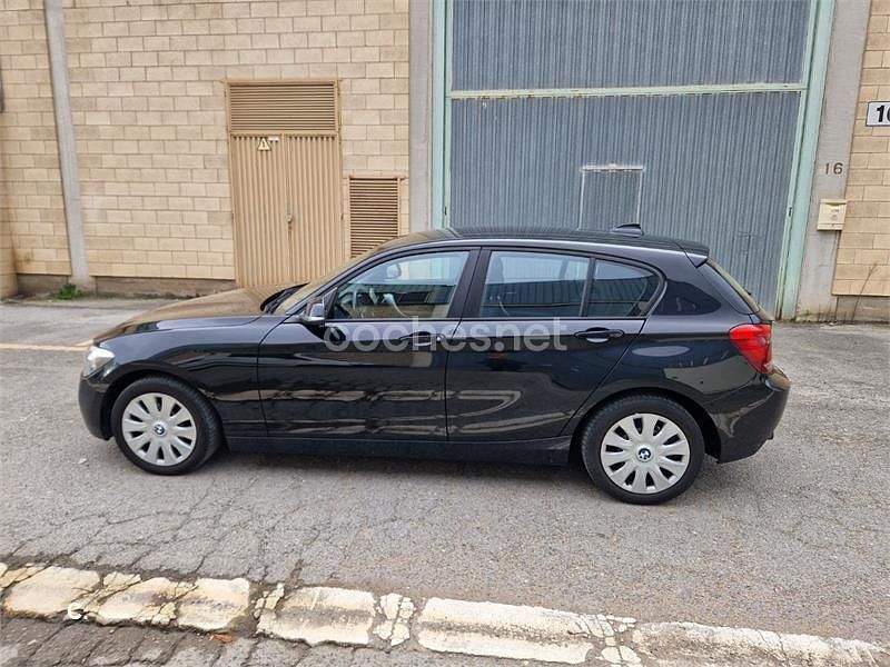 Negro Usado 2014 BMW 116 Sport Line Utilitario | 8499 € (Buen precio) - Imagen 1/4