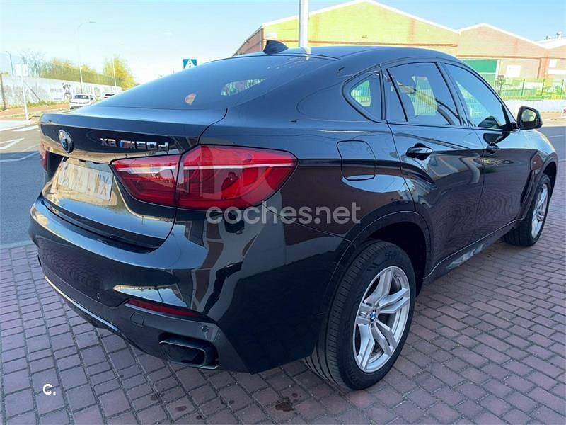 Käytetty BMW X6 M50 M Performance 381 HP (280 kW) 2015 Musta Katumaasturi