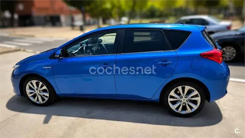 Usado Toyota Auris Hybrid Advance 136 CV (100 kW) 2014 Azul Berlina