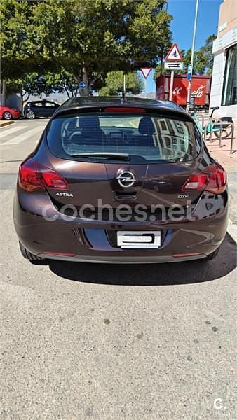 Usado Opel Astra Excellence 110 HP (80 kW) 2012 Castanho Sedan