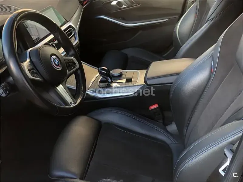 Usado BMW 320e 190 CV (139 kW) 2021 Negro Familiar