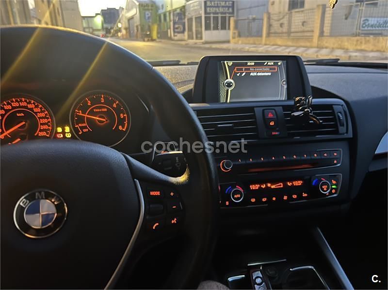 Negro Usado 2012 BMW 116 Sport Line Utilitario | 8000 € (Buen precio) - Imagen 1/4