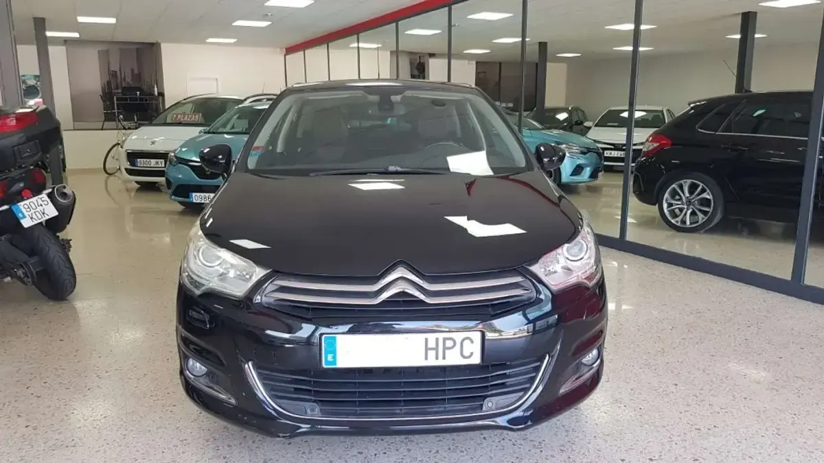 Usado Citroën C4 Exclusive 114 CV (83 kW) 2013 Negro Utilitario