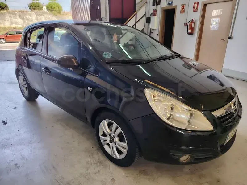 Usado Opel Corsa 100 CV (73 kW) 2010 Negro Utilitario