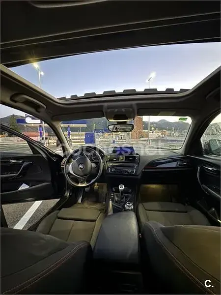 Usado BMW 118 Sport Line 143 CV (105 kW) 2012 Negro Utilitario