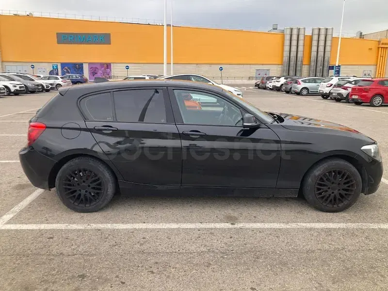 Usado BMW 118 Comfort Edition 143 CV (105 kW) 2012 Negro Utilitario