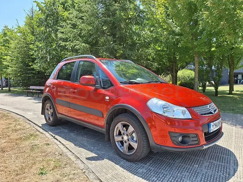 Usado Suzuki SX4 GL 135 CV (99 kW) 2012 Naranja SUV