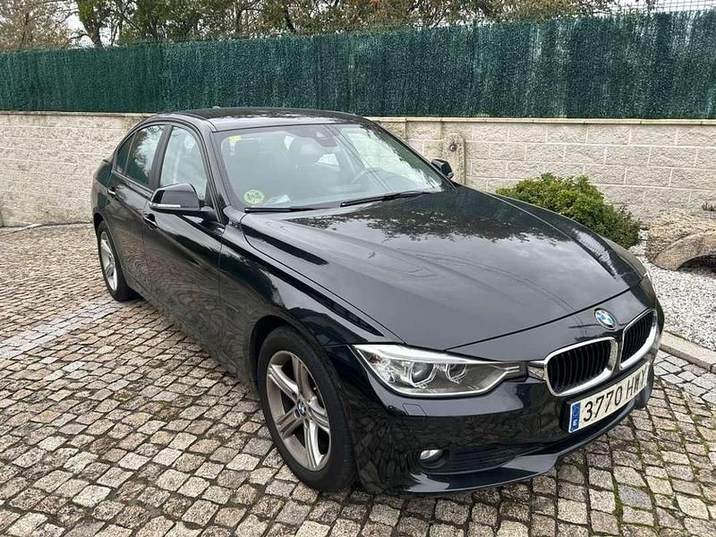 Negro Usado 2014 BMW 318 Luxury Line Berlina | 11.800 € (Buen precio) - Imagen 1/4