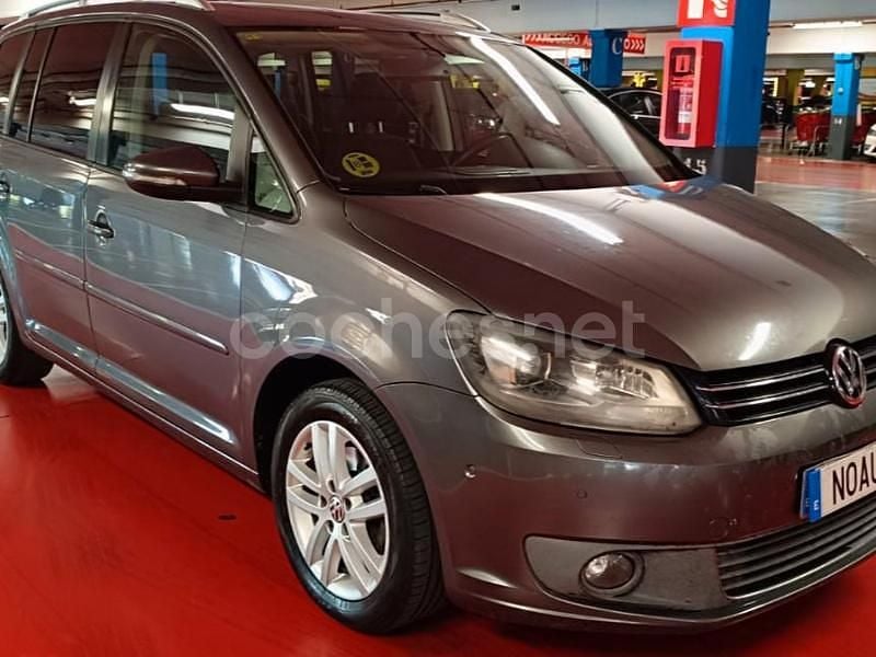 Gris / plata Usado 2011 VW Touran Edition Monovolumen | 7490 € (Precio justo) - Imagen 1/4