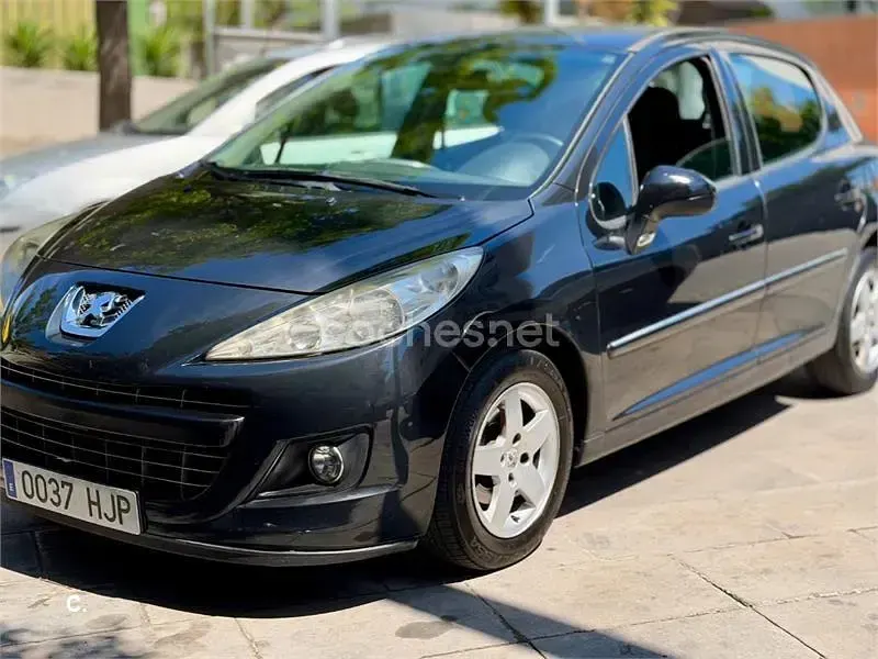 Usado Peugeot 207 Active 75 CV (55 kW) 2012 Negro Berlina