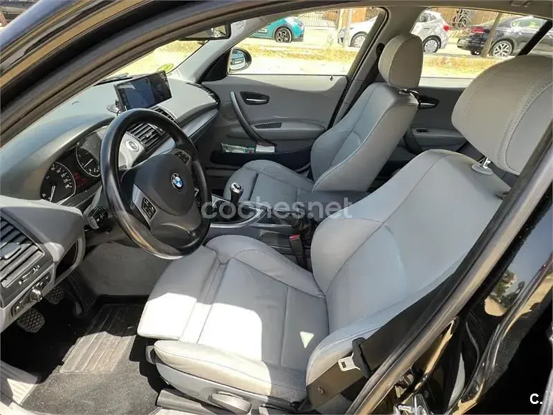 Usado BMW 116 115 CV (84 kW) 2005 Negro Utilitario