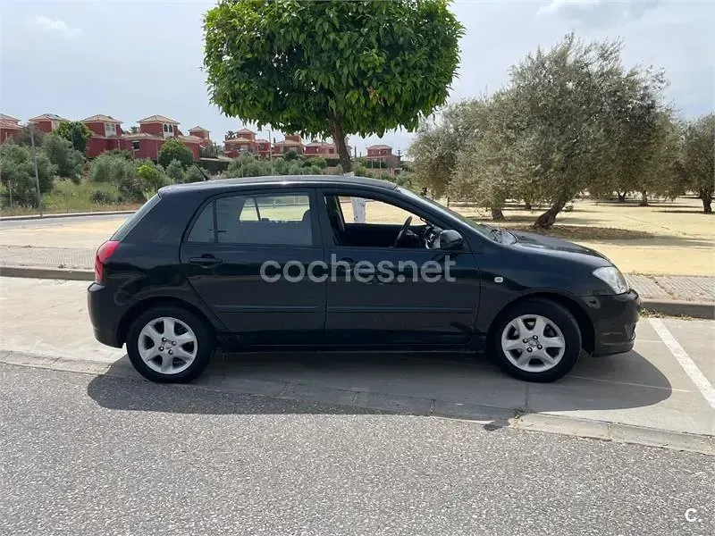 Usado Toyota Corolla Sol 90 CV (66 kW) 2006 Negro Berlina