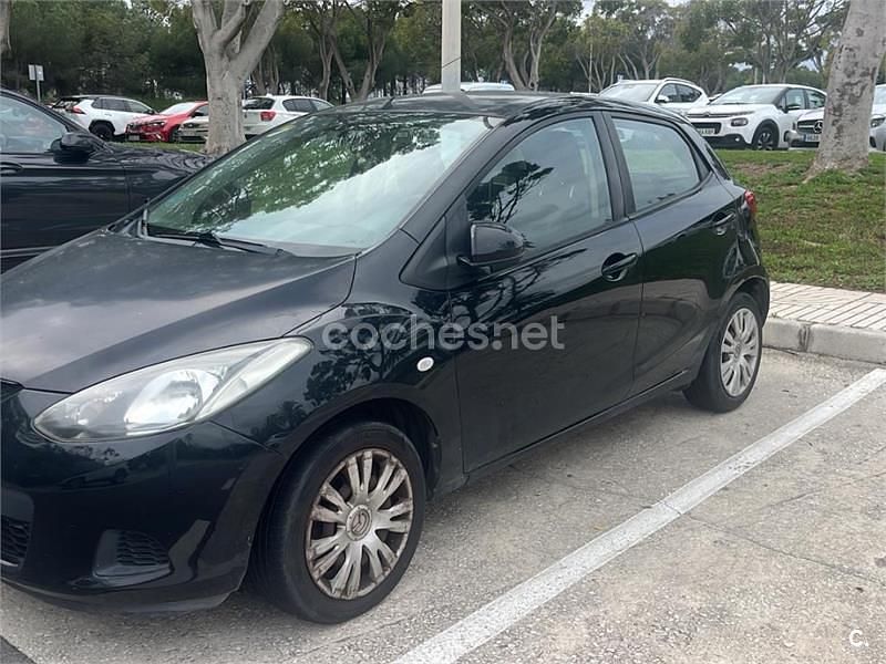 Usado Mazda 2 Active 75 CV (55 kW) 2009 Negro Utilitario