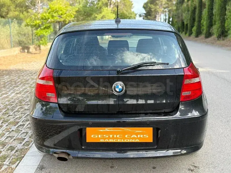 Usado BMW 116 122 CV (89 kW) 2009 Negro Utilitario