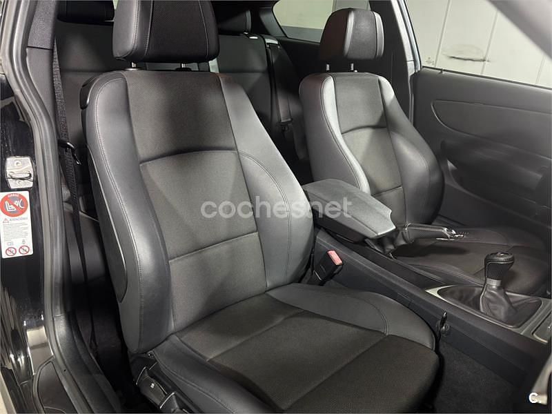 Usado BMW 118 143 CV (105 kW) 2009 Negro Utilitario