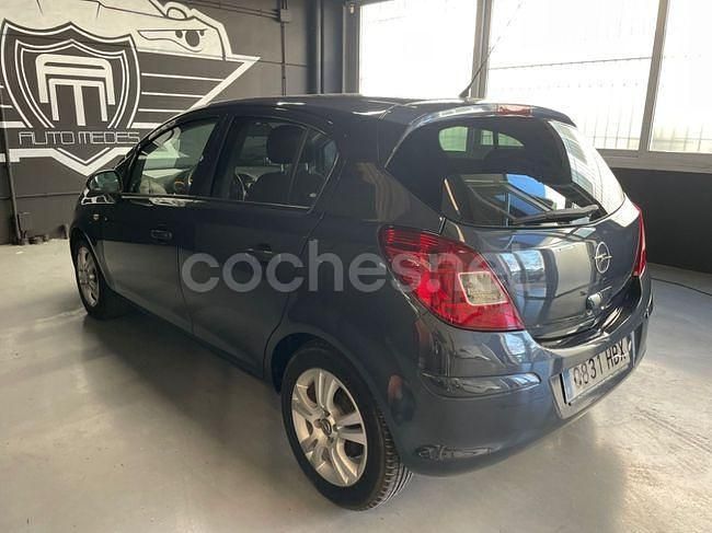 Usado Opel Corsa 100 CV (73 kW) 2011 Gris / plata Berlina