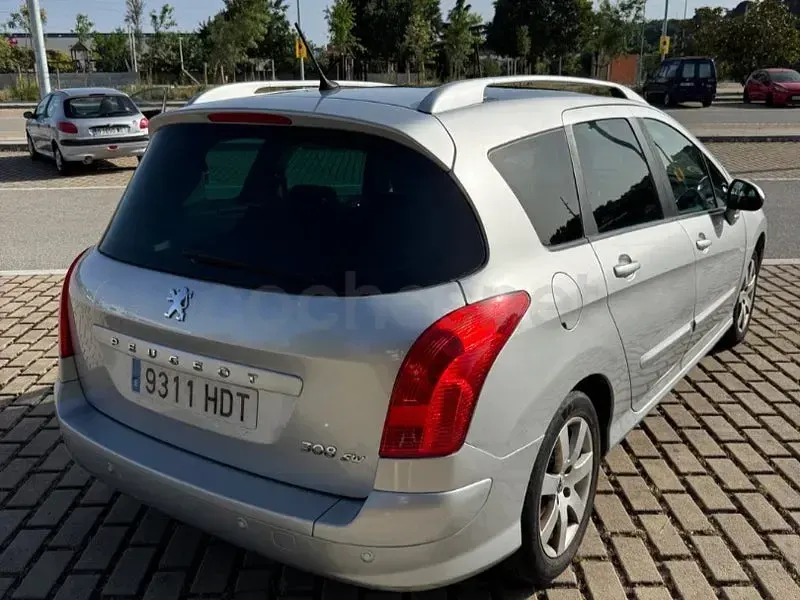 Usado Peugeot 308 SW Sportium 92 CV (67 kW) 2011 Gris / plata Familiar