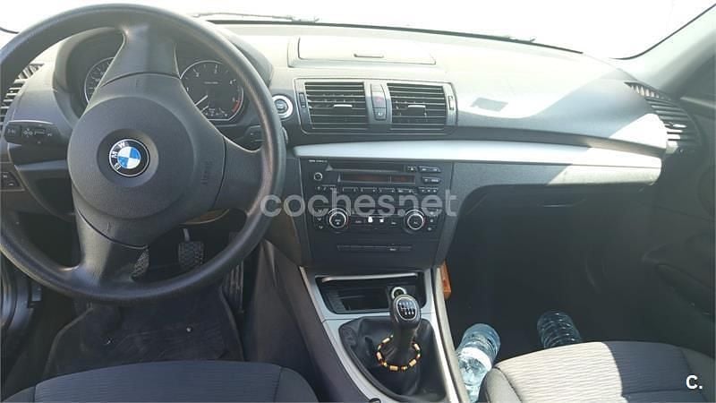 Negro Usado 2010 BMW 118 Sport Line Utilitario | 5900 € (Buen precio) - Imagen 1/4