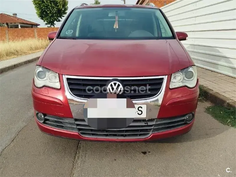 Usado VW Touran 105 CV (77 kW) 2008 Granate Monovolumen