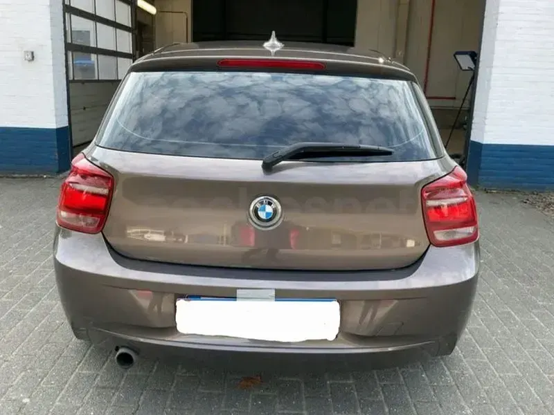 Usado BMW 116 Efficient Dynamics 116 CV (85 kW) 2014 Marrón Utilitario