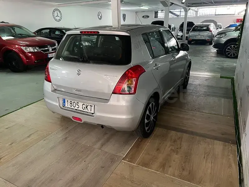 Usado Suzuki Swift GL 92 CV (67 kW) 2009 Gris / plata Utilitario