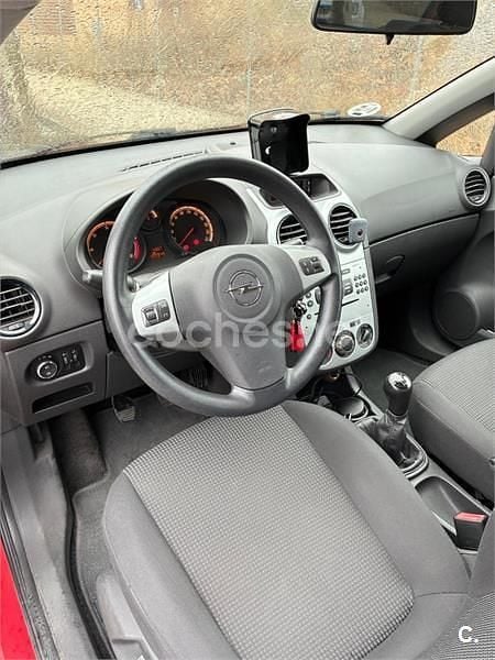 Usado Opel Corsa Selective 75 CV (55 kW) 2012 Rojo Berlina