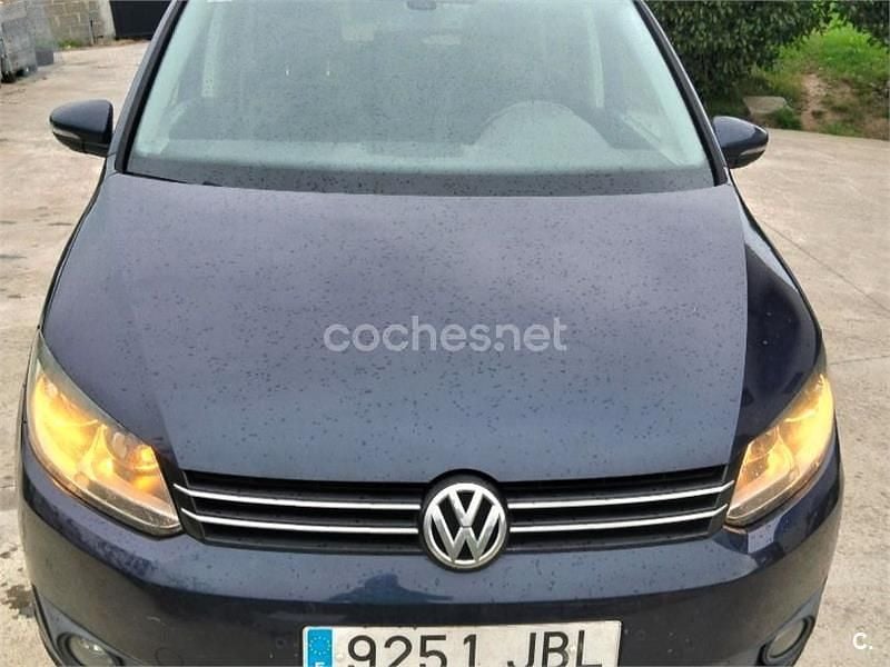 Usado VW Touran Advance 105 CV (77 kW) 2014 Azul Monovolumen