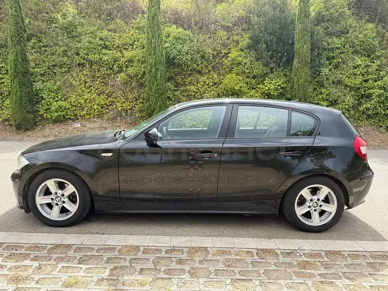 Usado BMW 120 150 CV (110 kW) 2004 Negro Utilitario