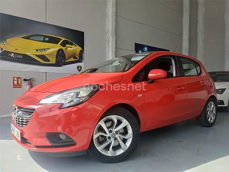 Usado Opel Corsa Expression 75 HP (55 kW) 2015 Vermelho Sedan