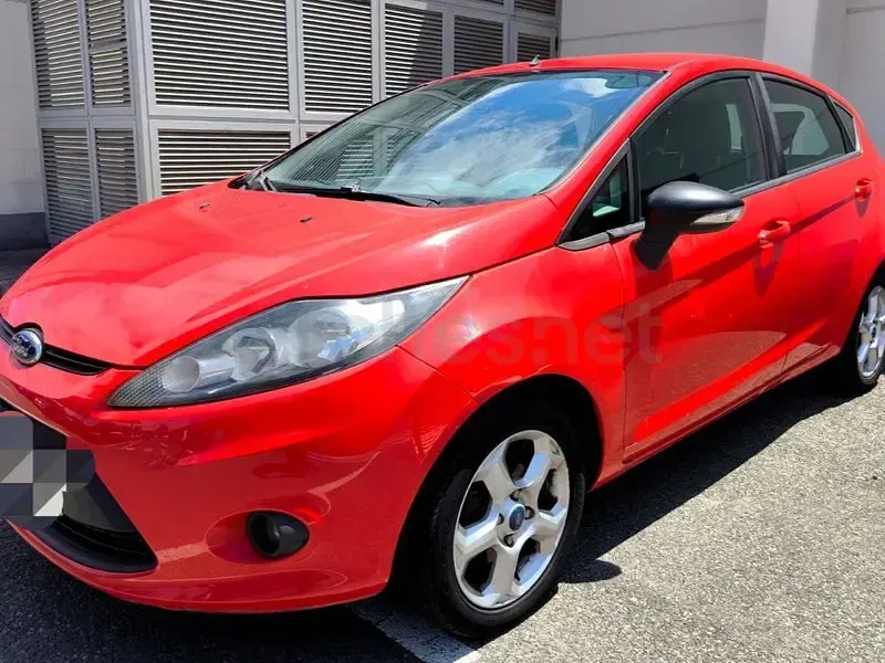 Usado Ford Fiesta Trend 82 CV (60 kW) 2011 Rojo Berlina