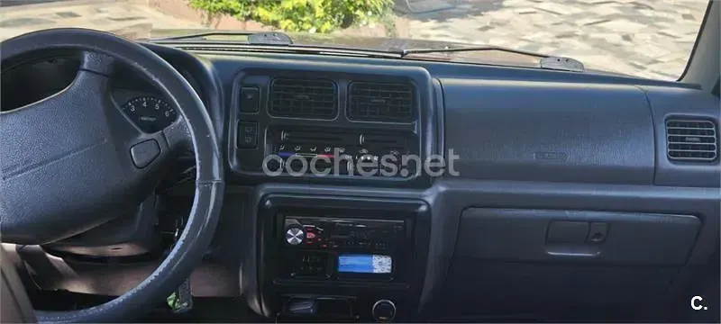Usado Suzuki Jimny 80 CV (58 kW) 1999 Granate SUV